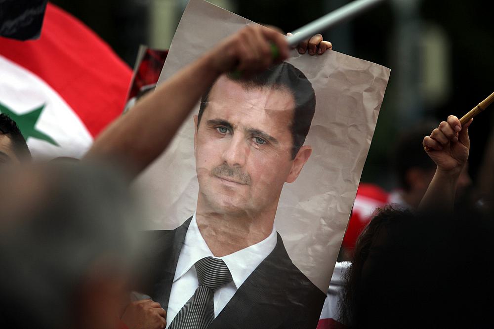 Bild von Baschar al-Assad auf einer Syrien-Demonstration (Archiv)