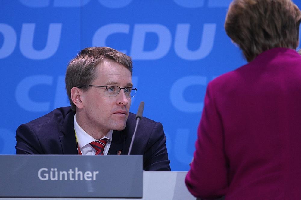 Daniel Günther und Angela Merkel (Archiv)