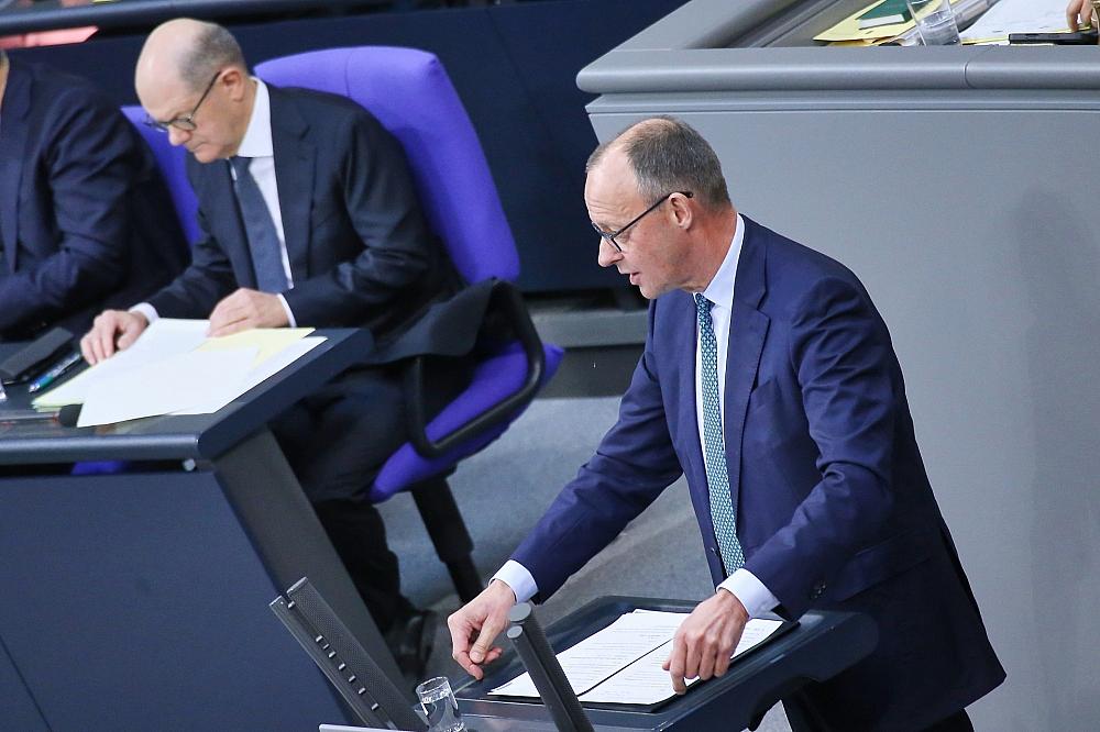 Olaf Scholz und Friedrich Merz am 11.02.2025