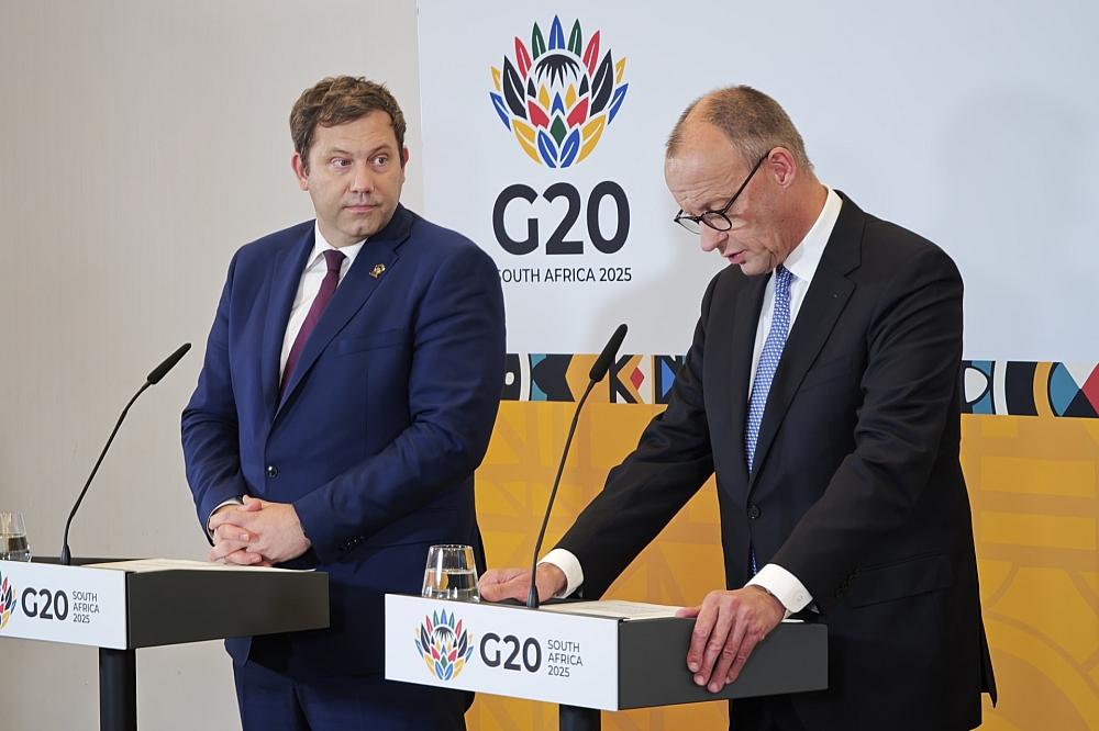 Merz betont Afrikas Potenzial nach G20-Gipfel in Johannesburg Lars Klingbeil und Friedrich Merz am 23.11.2025